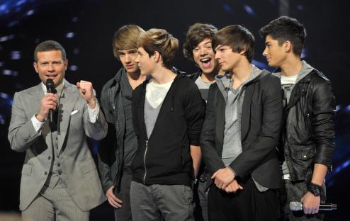 Dermot O'Leary with One Direction on The X Factor.