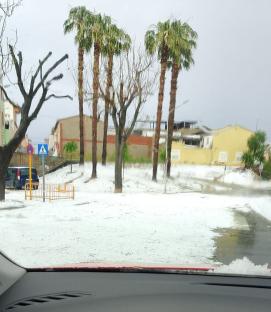 Hail covering the ground in Valencia, Spain.