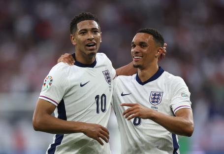 Jude Bellingham and Trent Alexander-Arnold of England celebrating a goal.
