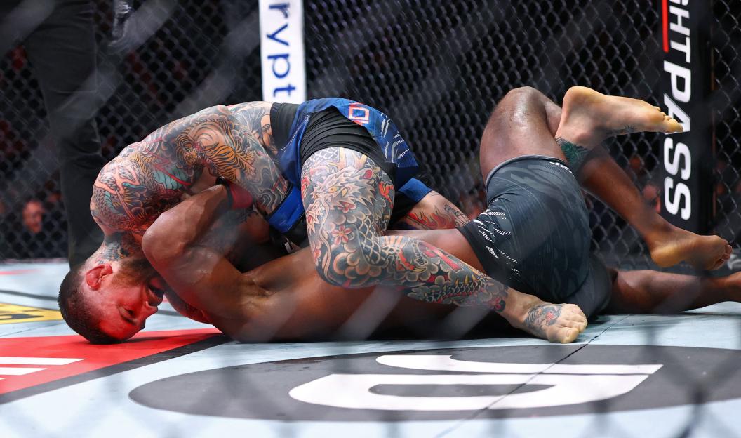 Leon Edwards in action against Sean Brady during a UFC welterweight bout.