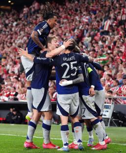 Manchester United players celebrating a goal.