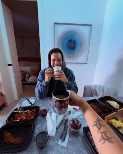 Man and woman enjoying breakfast together.