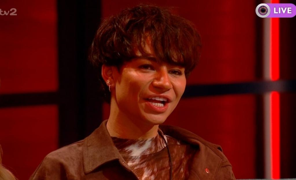 Sam, an evicted housemate from Big Brother, smiling while on the ITV2 show.