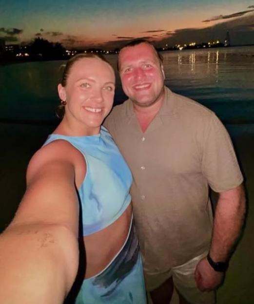 Selfie of Zoe Aldcroft and Luke Stratford at sunset.