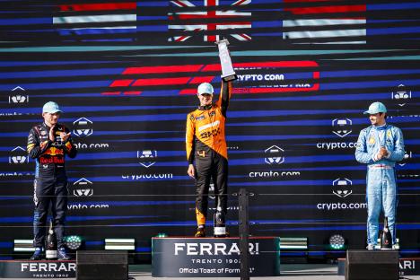 Formula 1 podium: drivers celebrating.