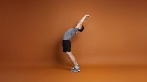 Man performing a backbend exercise.