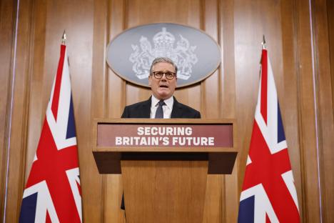 Keir Starmer giving a speech on securing Britain's future.