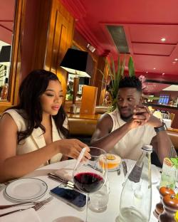 Melanie Kamayou and Andre Onana at a restaurant.