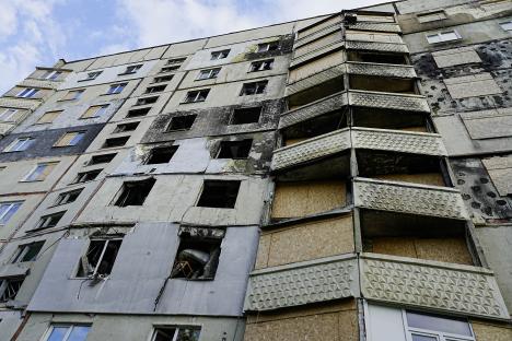 Damaged apartment building in Saltivka, East.