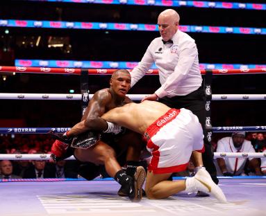 Chris Eubank Jr. and Conor Benn during a boxing match.