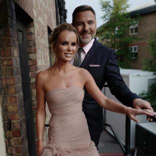 Amanda Holden and David Walliams posing together.