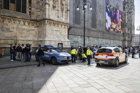Police and emergency responders at the scene of an incident near Milan Cathedral.
