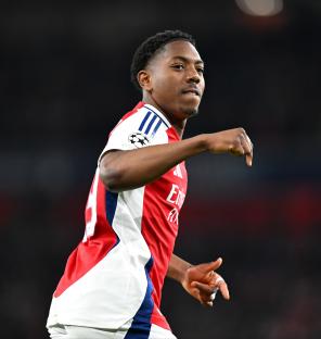 Myles Lewis-Skelly of Arsenal celebrating a victory.
