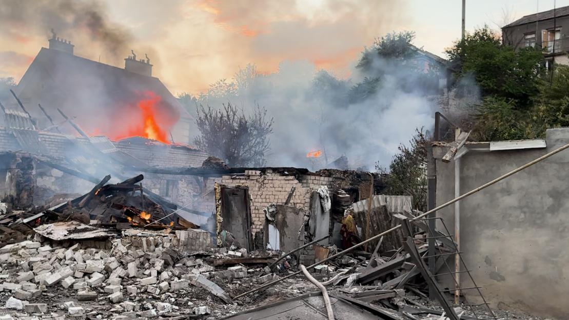 Fire and destruction of buildings in Kherson, Ukraine, following a Russian attack.