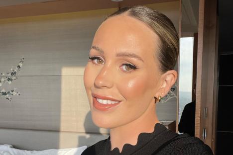 Proud stepmum Kate Ferdinand shares rare family snap as stepson TOWERS over her