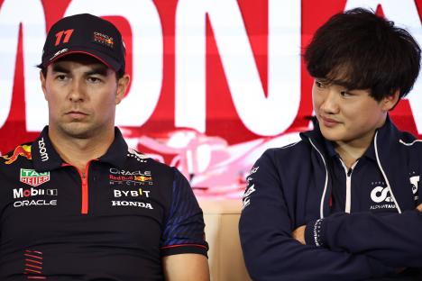Sergio Pérez and Yuki Tsunoda at a press conference.