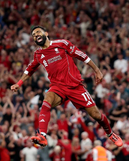Mohamed Salah of Liverpool celebrating a goal.