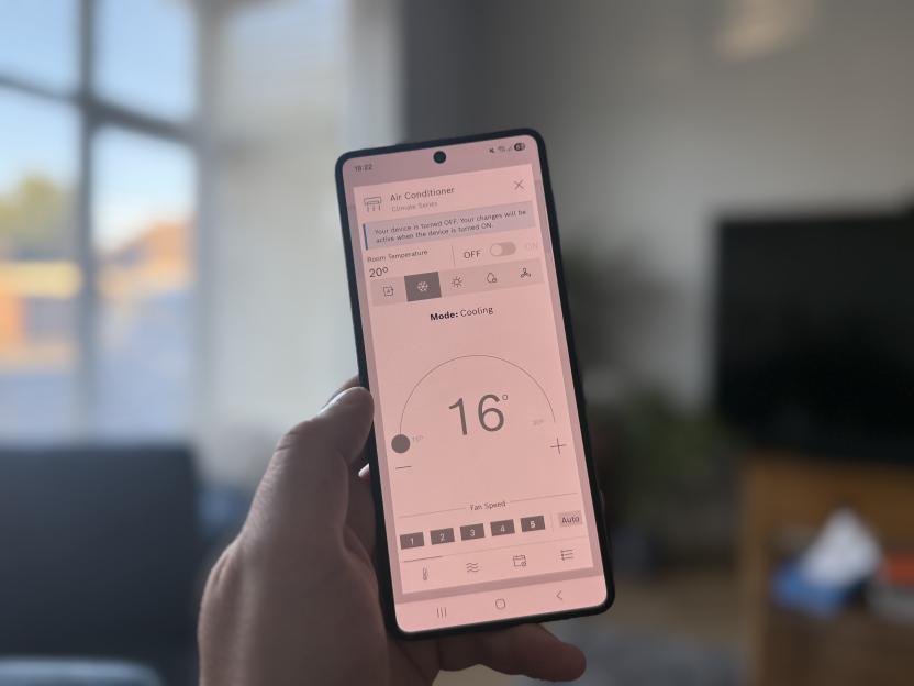 Smartphone displaying air conditioner controls.