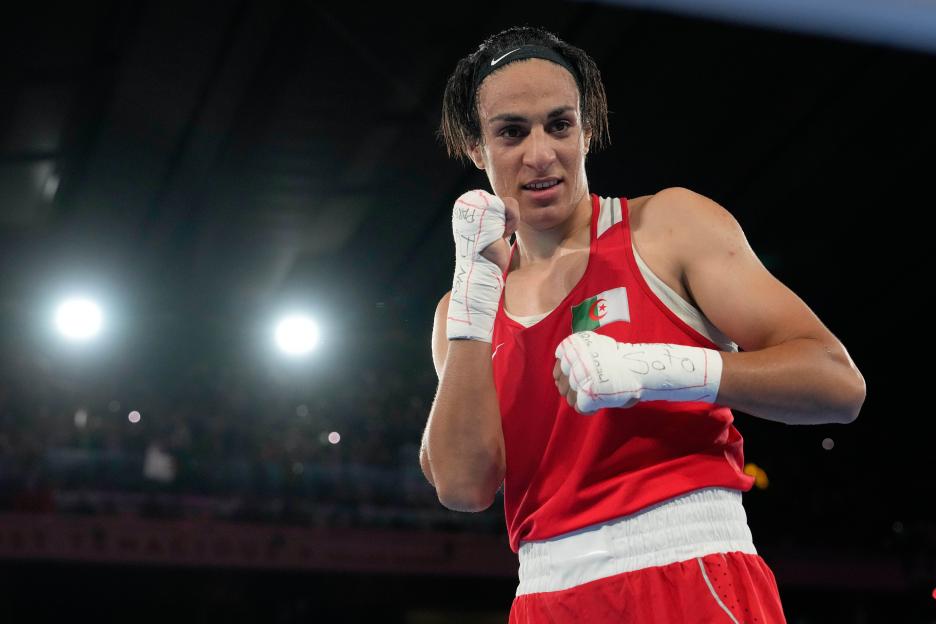 Imane Khelif of Algeria celebrates winning a gold medal in women's boxing.
