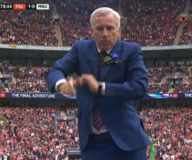 Alan Pardew celebrating a goal.