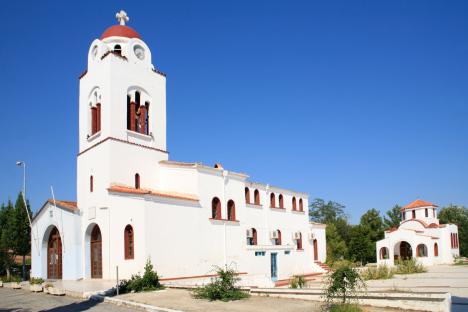 White church in Limenaria village, Thasos Island, Greece.
