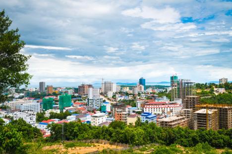 High-angle view of Sihanoukville, Cambodia, showing high-rise buildings and construction.