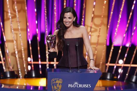 Marisa Abela accepting a BAFTA award.