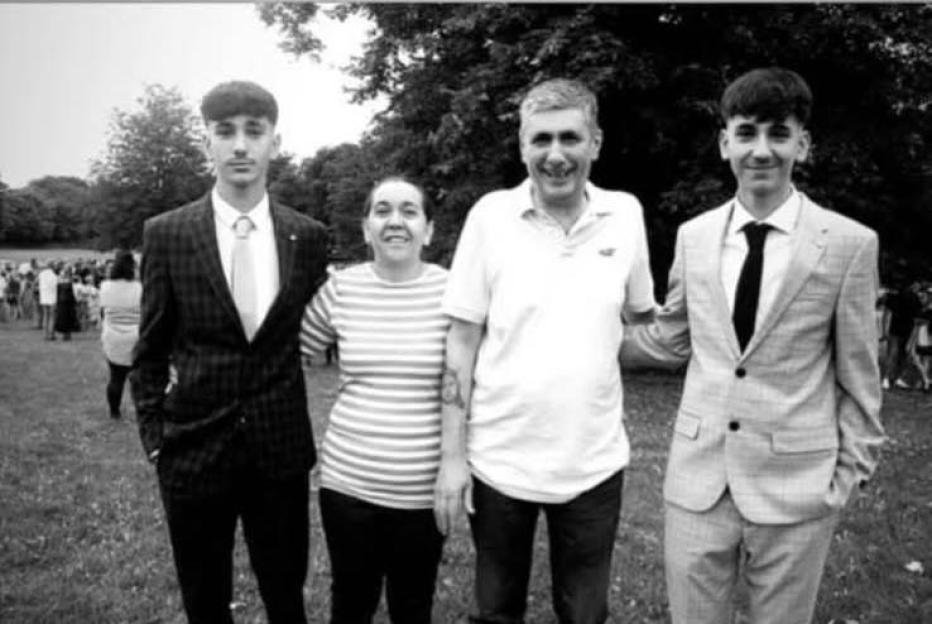 Black and white photo of a family.