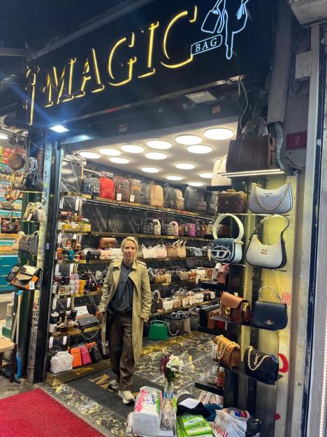 Clemmie Moodie in front of a "Magic Bag" store in Istanbul, Turkey.