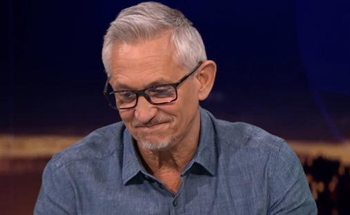 Gary Lineker holding a BBC Sport microphone.
