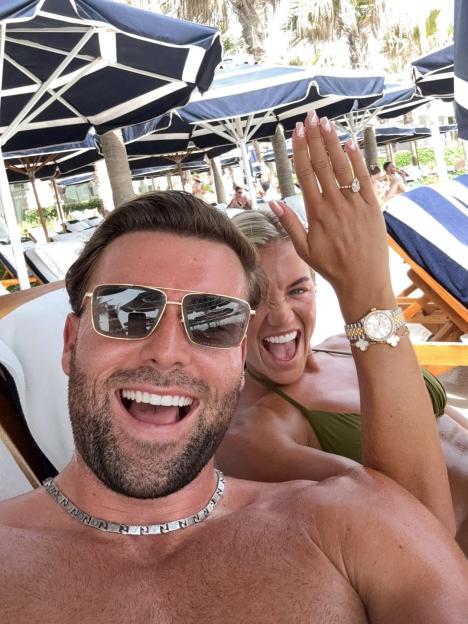 Molly Smith and Tom Clare celebrating their engagement.