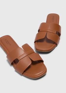 Brown leather sandals.