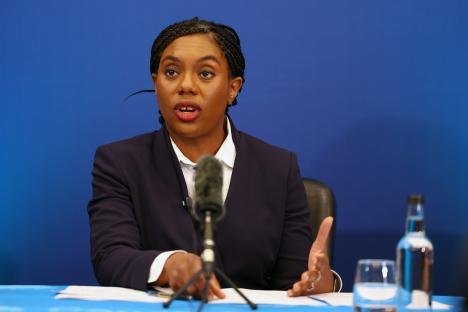 Kemi Badenoch speaking at a press conference.
