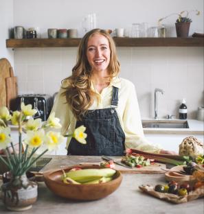 Lucy Upton, a paediatric dietitian and author, in her kitchen preparing food.