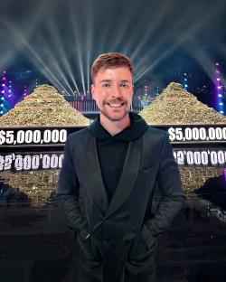 MrBeast standing between two piles of cash totaling $10,000,000.