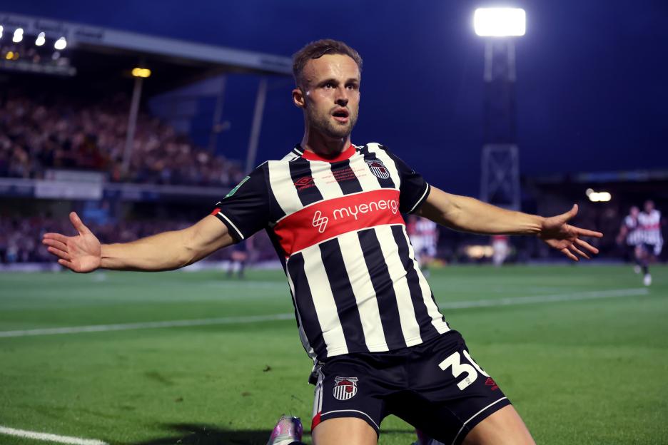 Charles Vernam of Grimsby Town celebrating a goal.