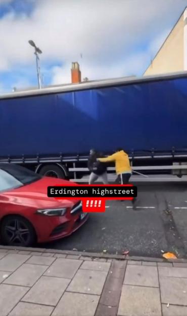 DRIVEN MAD Shocking moment road rage brawl breaks out on high street as men smack each other with METAL POLES in brutal scrap, TAKEN WITHOUT PERMISSION, https://x.com/CrimeLdn/status/1903433411009593437