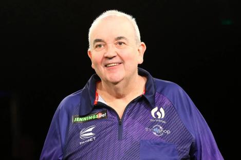 Darts legend Phil Taylor, 64, announces retirement from sport but immediately teases new career