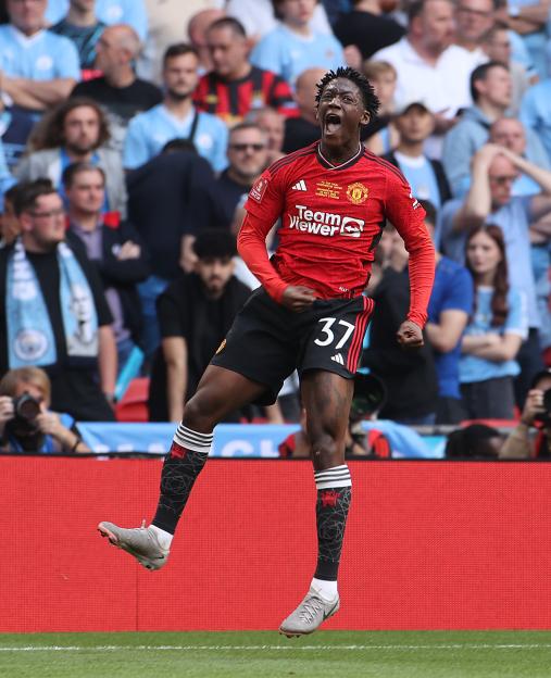 Kobbie Mainoo of Manchester United celebrating a goal.