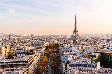Aerial view of Paris, France, with the Eiffel Tower in the background.
