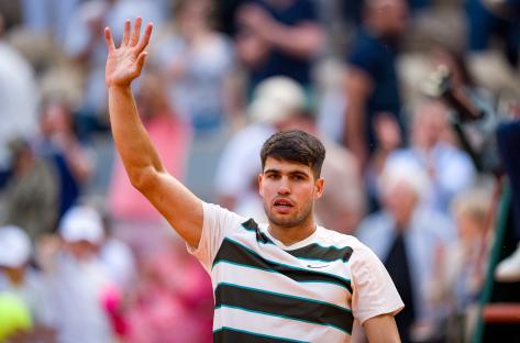 Carlos Alcaraz of Spain celebrates a tennis victory.
