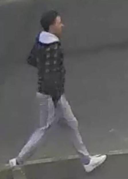 CCTV image of a man police wish to speak to.