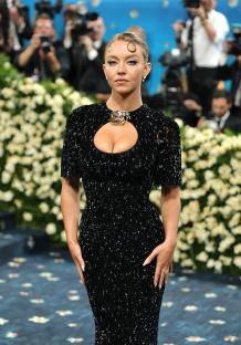 Sydney Sweeney at the Met Gala in a black sequined dress.
