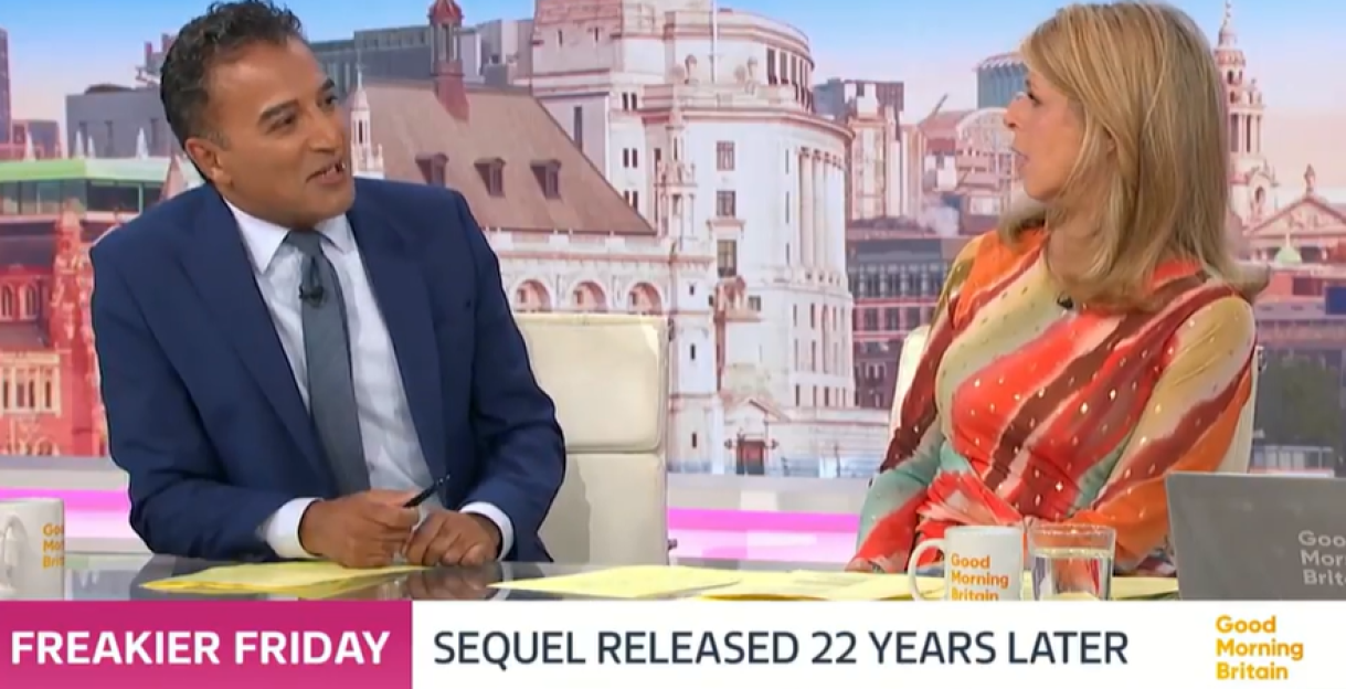 Two television hosts discussing the release of a sequel to the film "Freaker Friday".