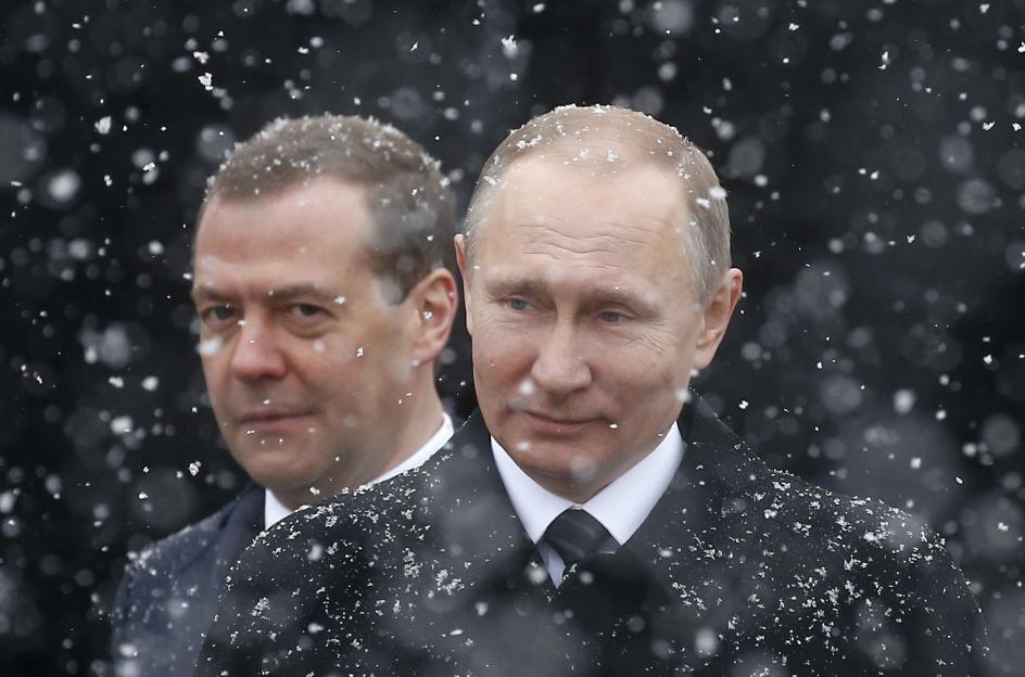 Vladimir Putin and Dmitry Medvedev in the snow.