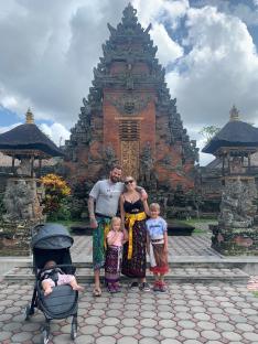Family in a swimming pool in Bali.