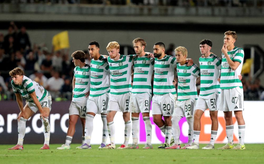 Celtic soccer players lined up for a penalty shootout.