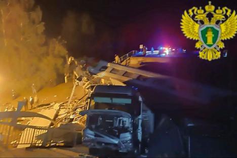 At least seven killed & dozens injured after bridge collapses and crushes passenger train in Russia