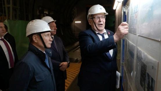 Vladimir Putin visiting a nuclear power plant under construction.