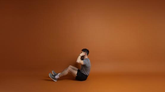 Man doing sit-ups.